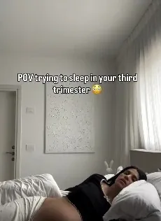 Reel about third-trimester sleep: Shani lying in bed